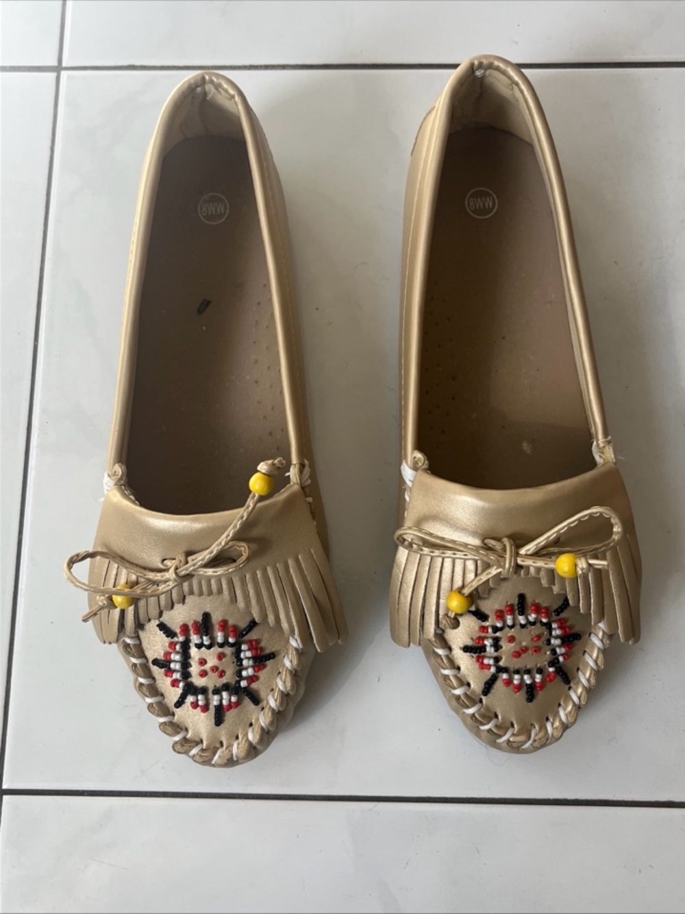Womens gold beaded fringed moccasin